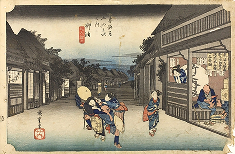夕暮れの宿場町で、旅人を宿へ引き込もうとする女性たちを描いた歌川広重《東海道五拾三次之内 御油 旅人留女》